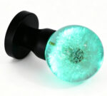 Handcrafted Dandelion Resin Door Handle Emitting Cyan Light, with a Black Circular Brass Base