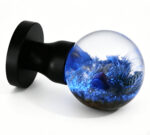 Micro-Landscape Resin Door Handle with Blue Illumination, featuring a Brass Base with a Black Circular Accent