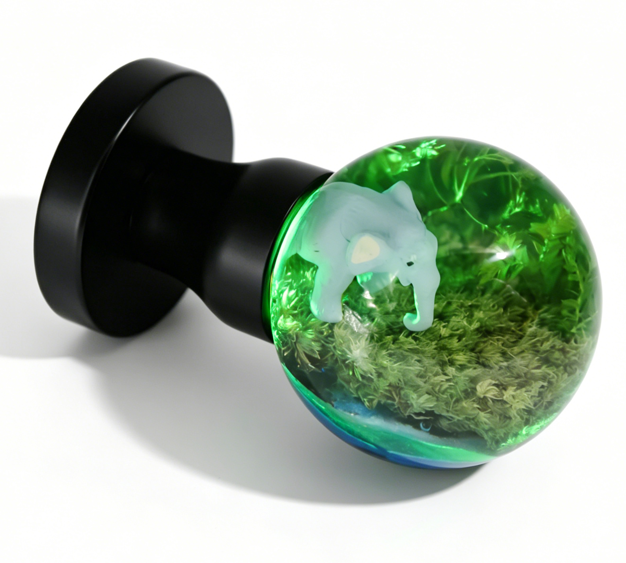 Cyan-Illuminated Elephant Resin Door Handle Elephant-Themed Resin Door Handle Emitting Cyan Light, Mounted on a Round Black Brass Base