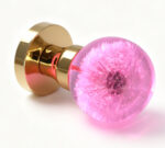 Resin Door Knob Featuring a Pink-Glow Dandelion, Mounted on a Round Gold Brass Base