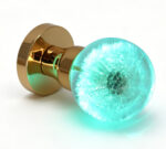Resin Door Knob Featuring a Dandelion with Cyan Illumination, Mounted on a Round Gold Brass Base