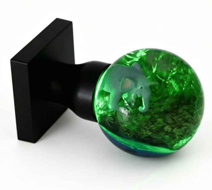 Green-Illuminated Elephant Resin Door Handle Elephant-Themed Resin Door Knob with Green Illumination, Mounted on a Black Square Brass Base