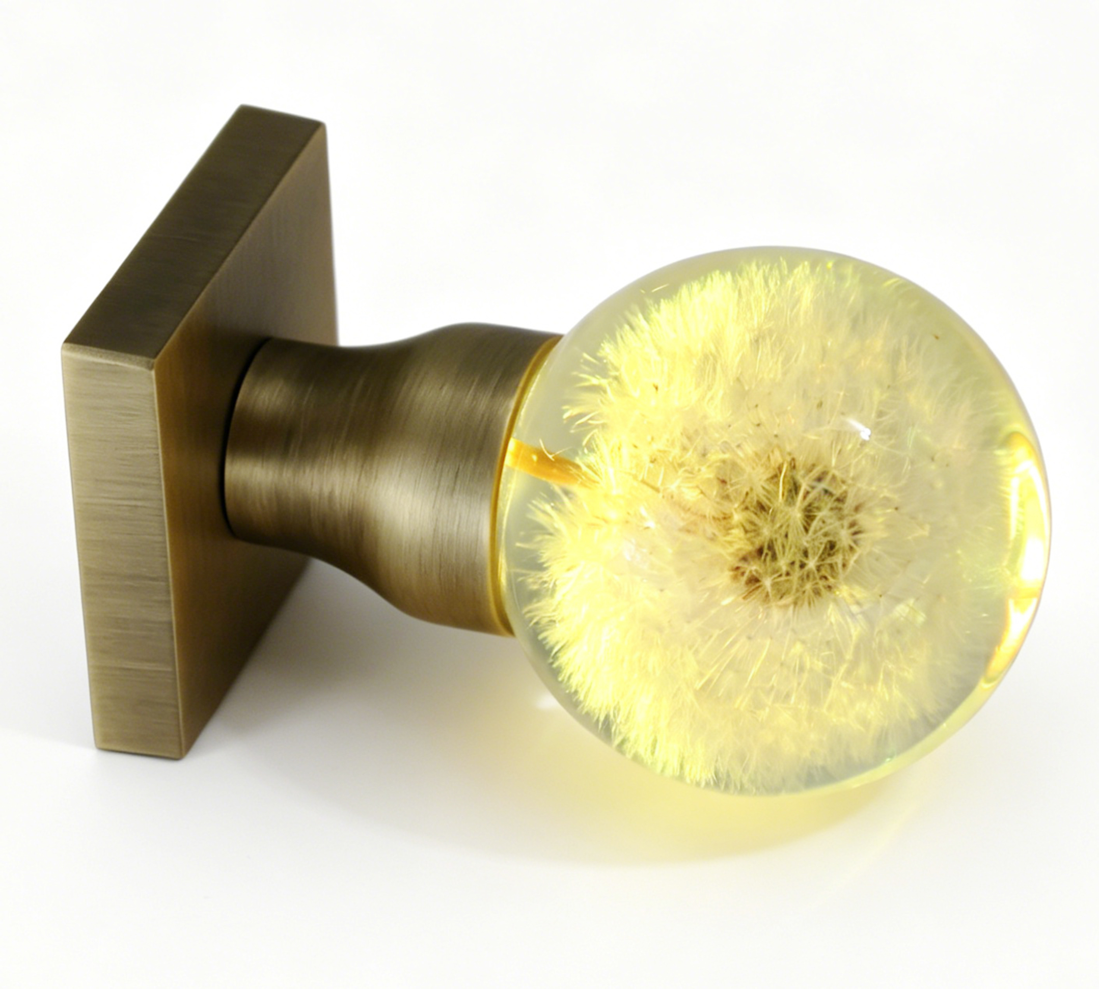 Dandelion Resin Door Handle with Warm Yellow Illumination Dandelion Resin Door Handle Emitting Yellow Light, with an Antique Bronze Square Base